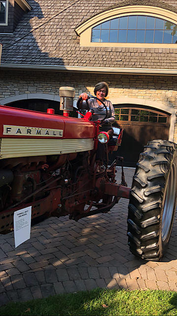 Cindy Lange Kubick A Tractor On Its Way To Help Farmers In Africa