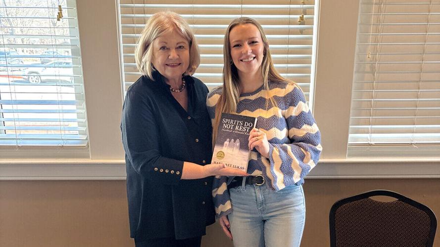 Graphic design student designs book cover for Nebraska author