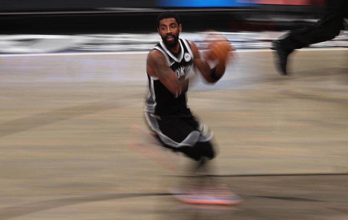 Kyrie Irving of the Brooklyn Nets dribbles against the Utah Jazz during their game at Barclays Center on Jan. 5, 2021 in New York City.