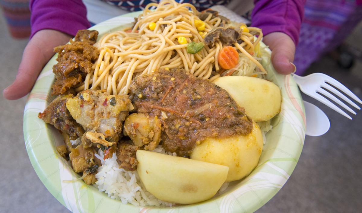 Karen food year journalstar provided buffet dish celebration lunch jan each during family
