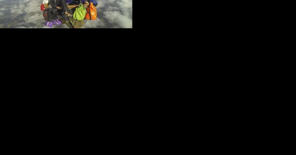 Elite pilots prepare for camping out in the sky as they compete in prestigious ballooning race