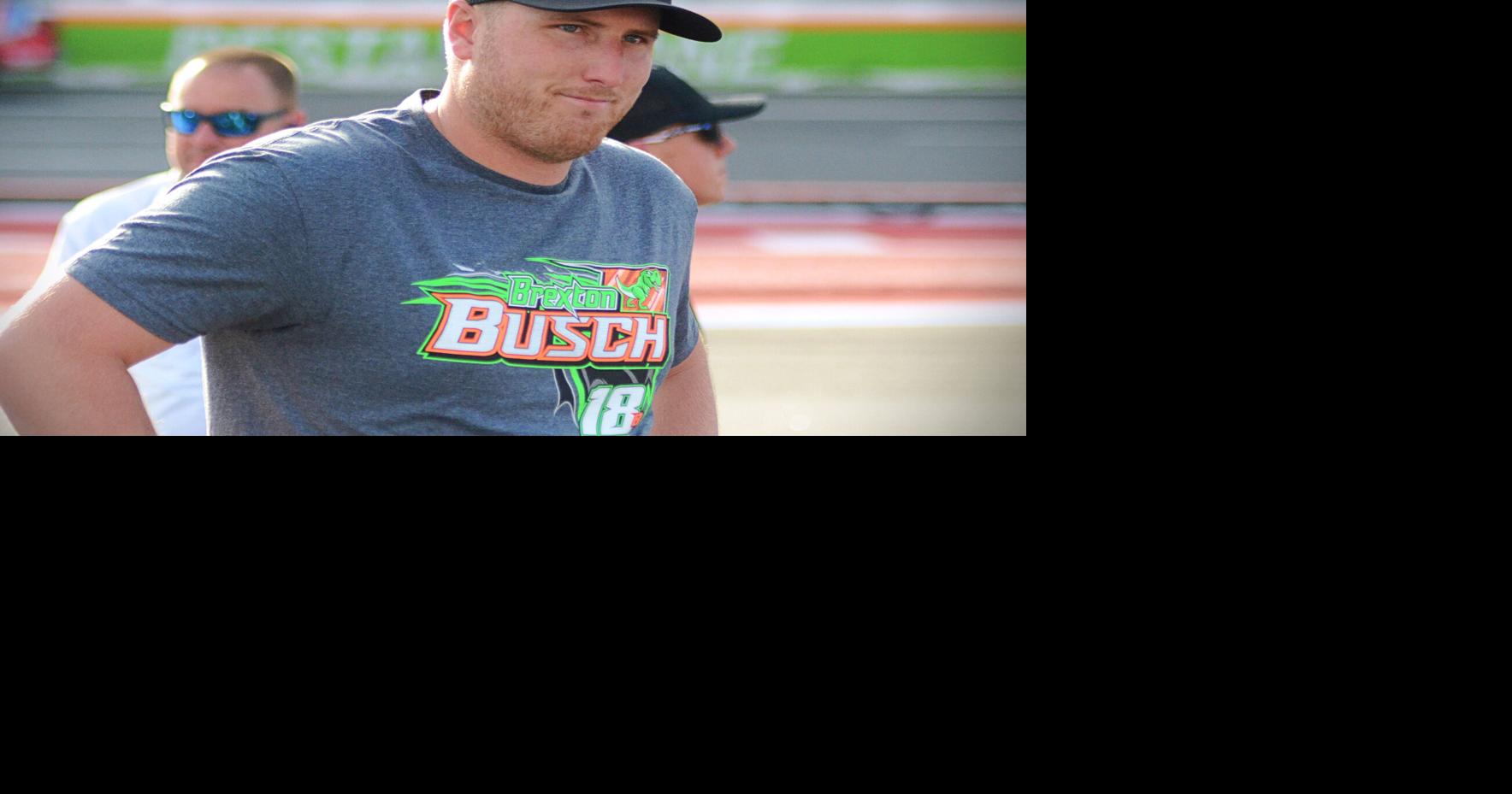 Austin Hill, wearing a Kyle Busch hat and a t-shirt for his son Brexton, prepares to drive Busch's car in the Coca-Cola 600 on May 24, 2026 at Charlotte Motor Speedway.