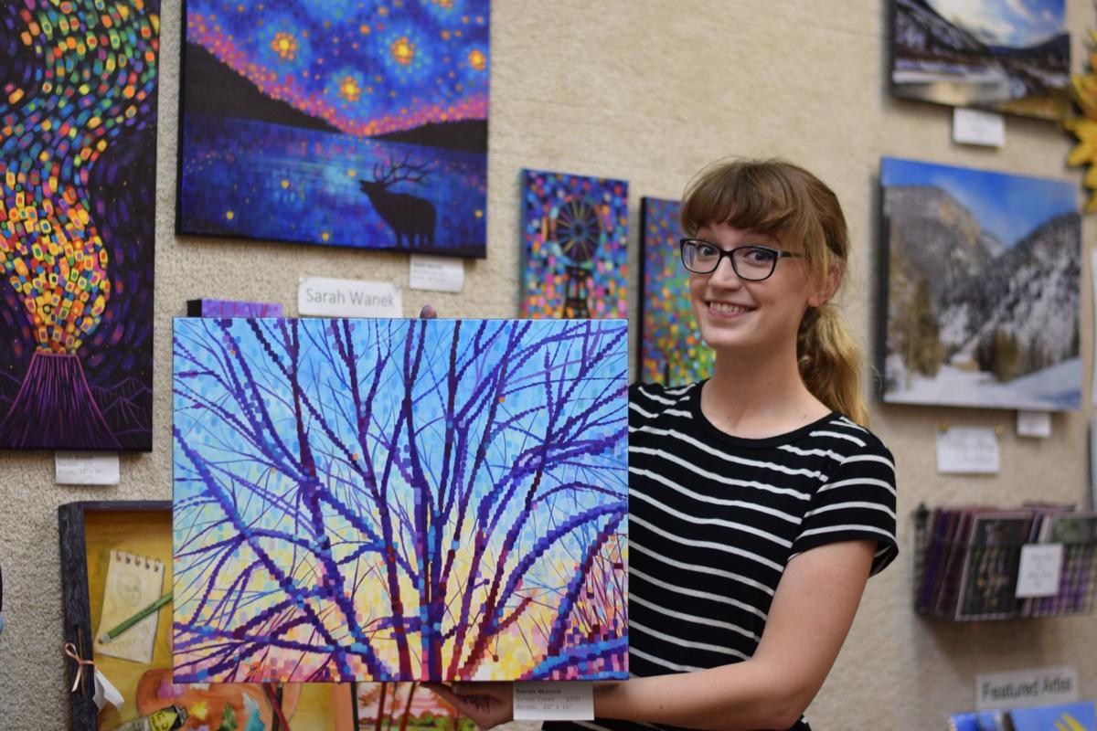 Sarah Wanek with "Sunset Cubed" painting