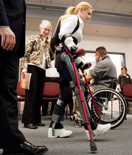 From paralyzed to walking again -- Madonna demonstrates new technology