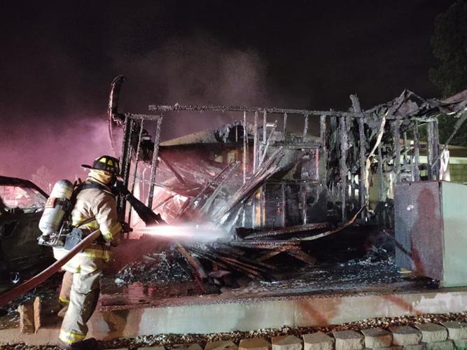 Earlymorning fire destroys garage, damages house in Caledonia