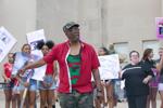 James Malcolm's father attends the justice rally