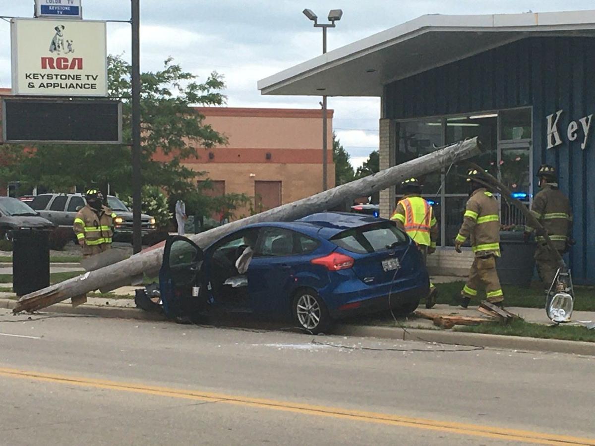 Car vs. utility pole on Douglas Avenue currently between Melvin and Kingston