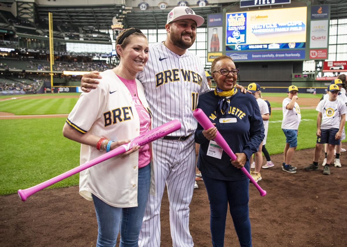 Brewers help raise breast cancer awareness in visit to Aurora patients