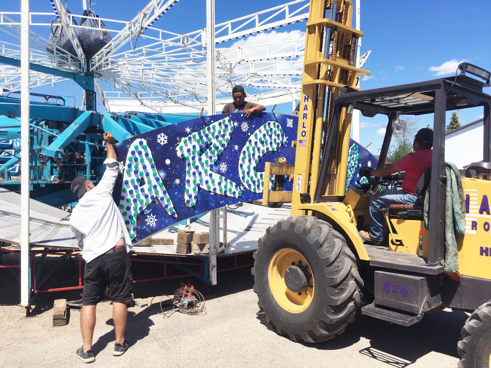 Photos Carnival ride workers and others prepare the new Burlington