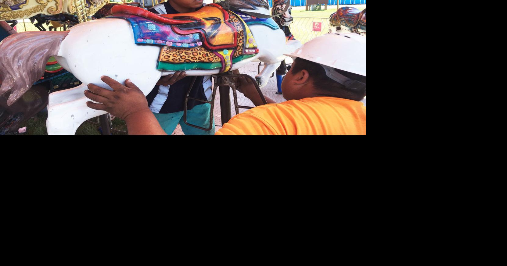 Photos Carnival ride workers and others prepare the new Burlington