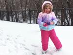 Sophie Buford of Burlington plays in the snow