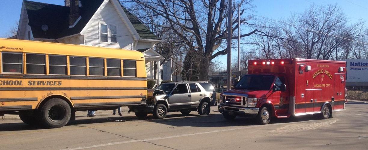 Woman taken to hospital following collision involving school bus