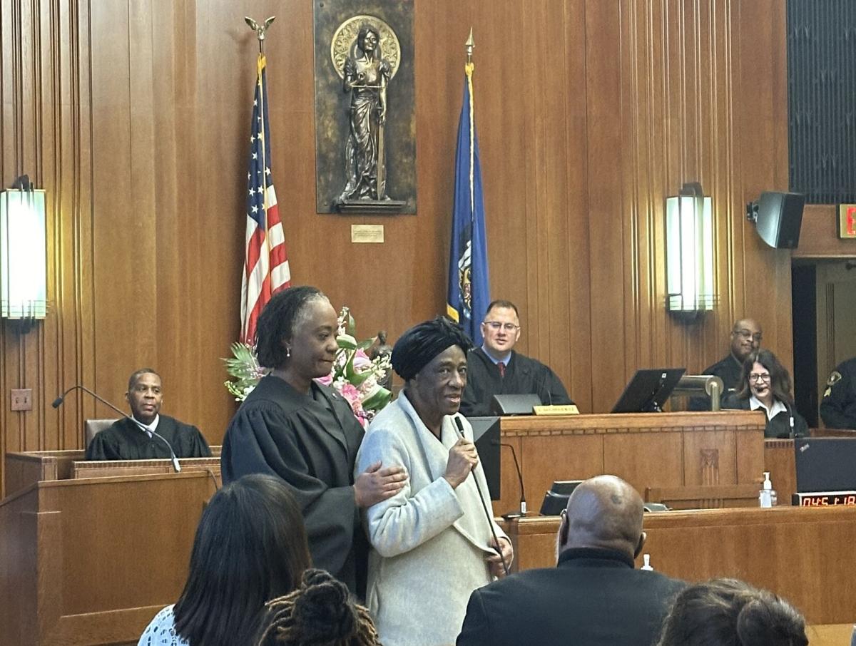 Judge Young honored at investiture ceremony with mother by her side