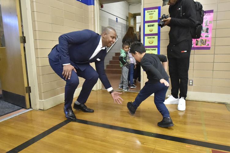 Principal for a day: Caron Butler shares his story, inspires students