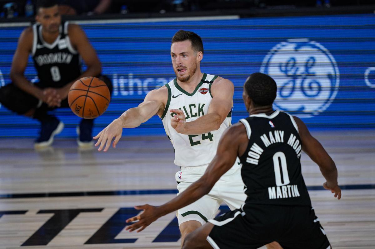 Giannis watches in 2nd half as Nets beat Bucks 119-116 ...