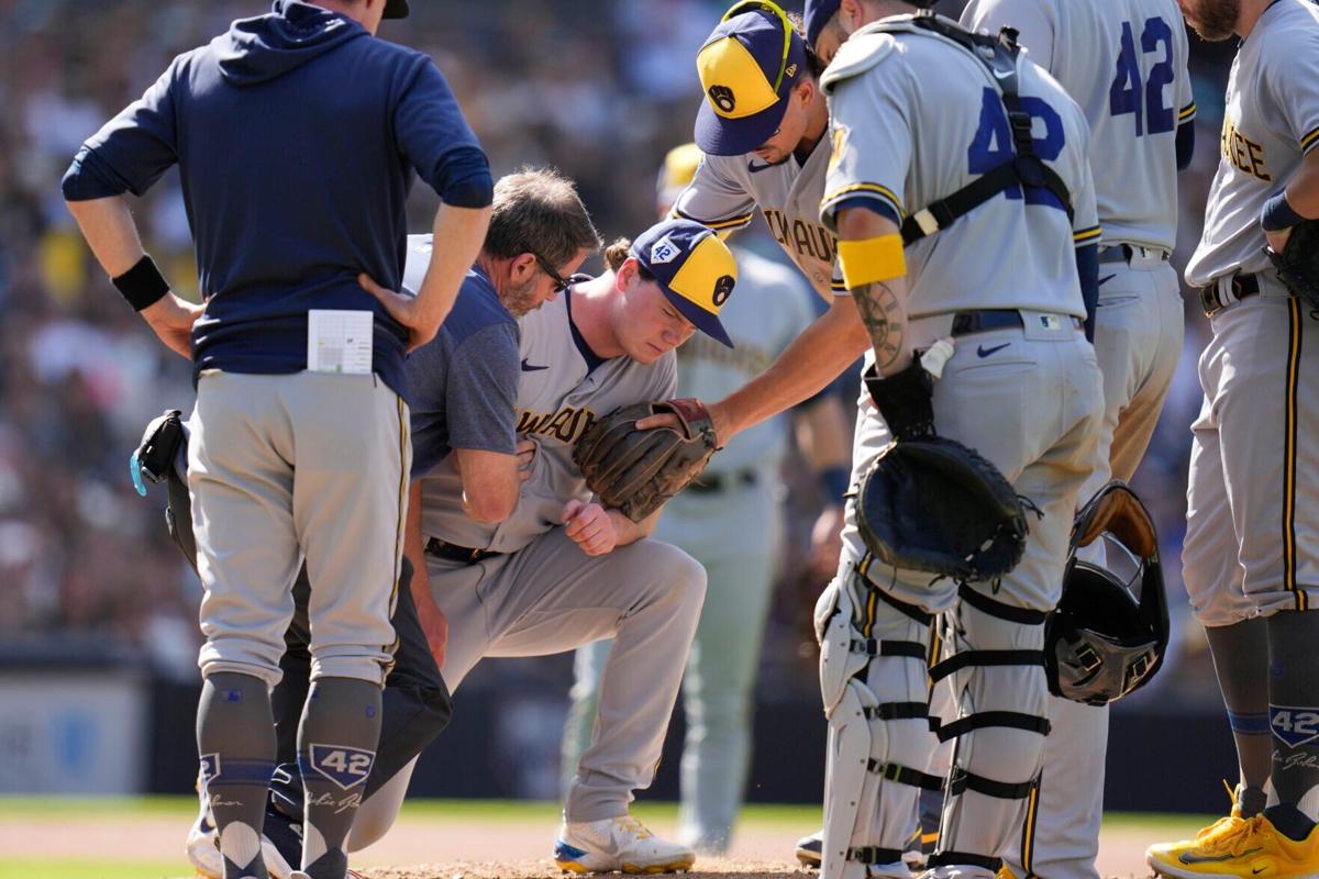 San Diego Padres' Jake Cronenworth heads back to the dugout after