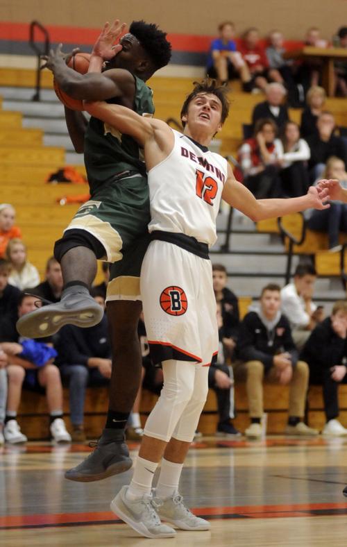 In Photos: Burlington edges Case 70-68 in opener