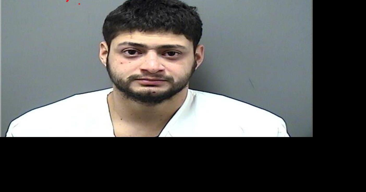 Man charged with shooting two Racine officers