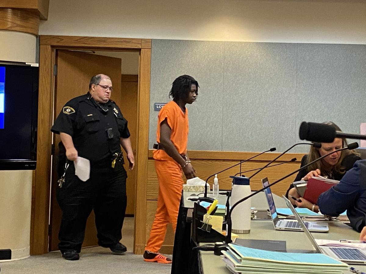 Smith Jr. escorted into courtroom