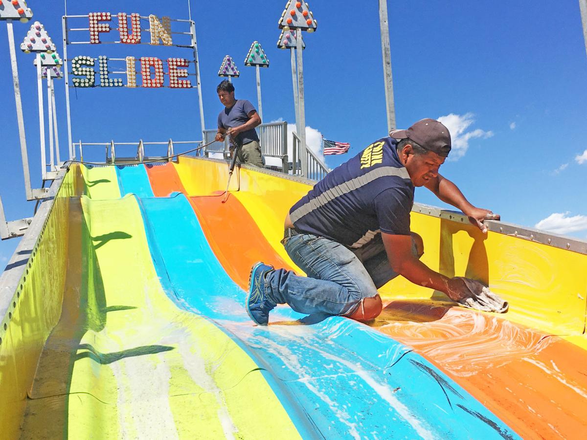 Photos Carnival ride workers and others prepare the new Burlington