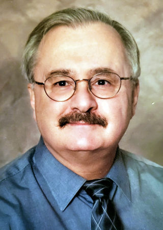 Thomas J. James, MD