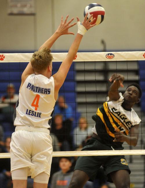 In Photos: Park rallies past Case in boys volleyball