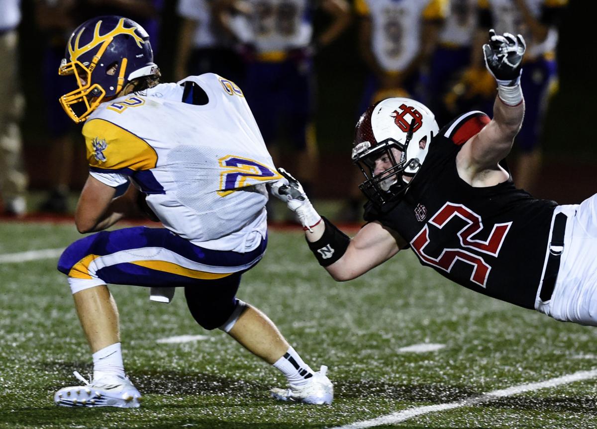 Prep football Nelson puts on a show for Union Grove