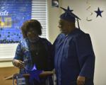 Travis Gardner receives his diploma