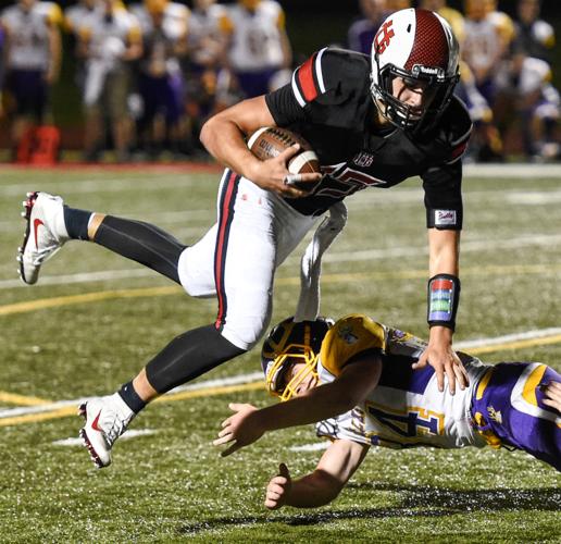 Prep football Nelson puts on a show for Union Grove