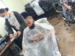 Courtney Krekling gives a haircut