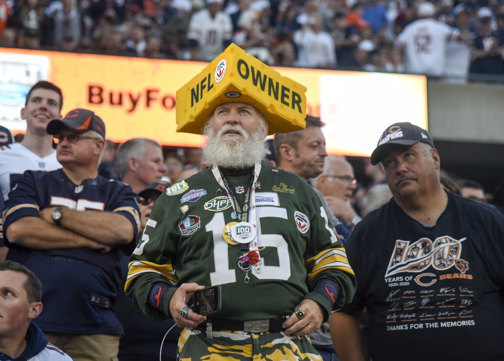 Green Bay Packers' fans who became owners stand with team