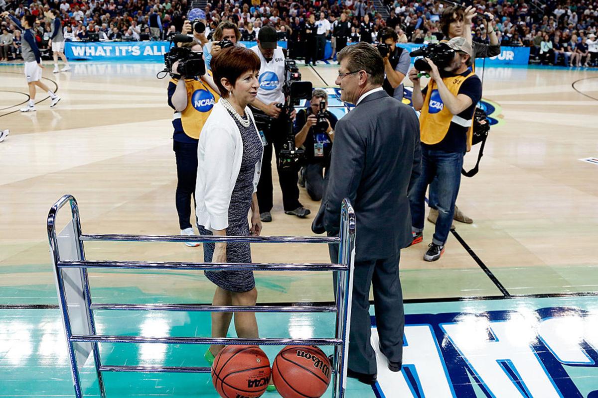 Head coach Muffet McGraw of the Notre Dame Fighting Irish (L) and head coach Geno Auriemma of the Connecticut Huskies meet prior to the start of the NCAA Women's Final Four National Championship at Amalie Arena on April 7, 2015 in Tampa, Florida. (Mike Carlson/Getty Images/TNS) *FOR USE WITH THIS STORY ONLY*