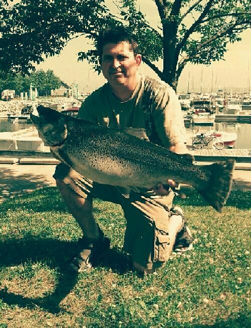 Jamesville boy reels in big bass while fishing with father on