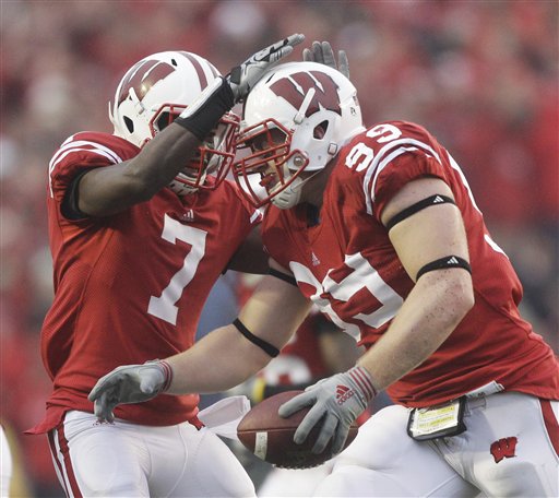 Wisconsin defensive tackle J.J. Watt #99 looks on during the game between  the Wisconsin Badgers and the Hawaii Warriors being played at Aloha Stadium  in Honolulu, Hawaii. The Wisconsin Badgers defeated the