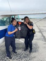 Melanie Figuereo-Colon with Officer Dana Juopperi