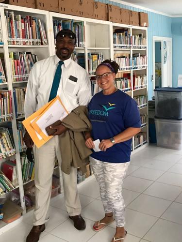 Susy Siel with Eleuthera District Superintendent Michael Culmer