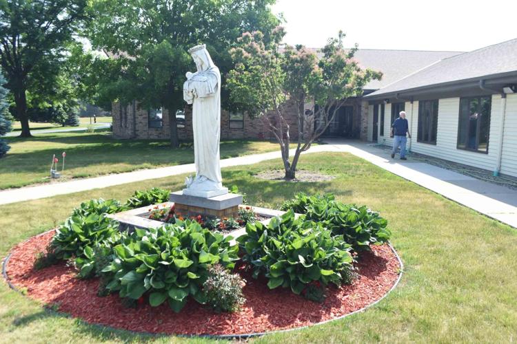 St. Francis Friary exterior shot with statue shows 146-acre religious site