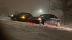 Cars iced over Tuesday evening as Racine County gets hit with first significant snowfall of the season