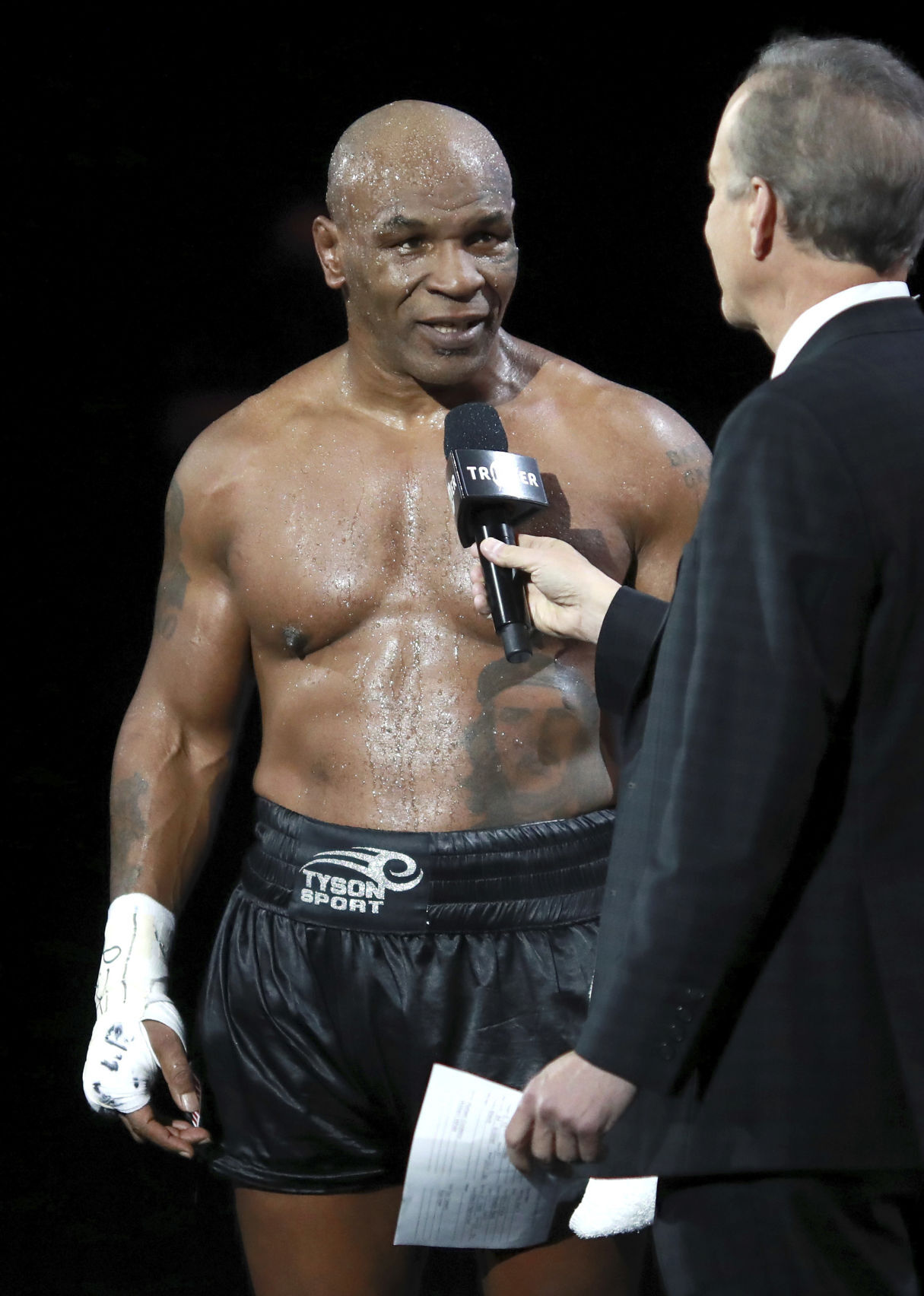 Mike Tyson returns to ring draws in exhibition with Jones