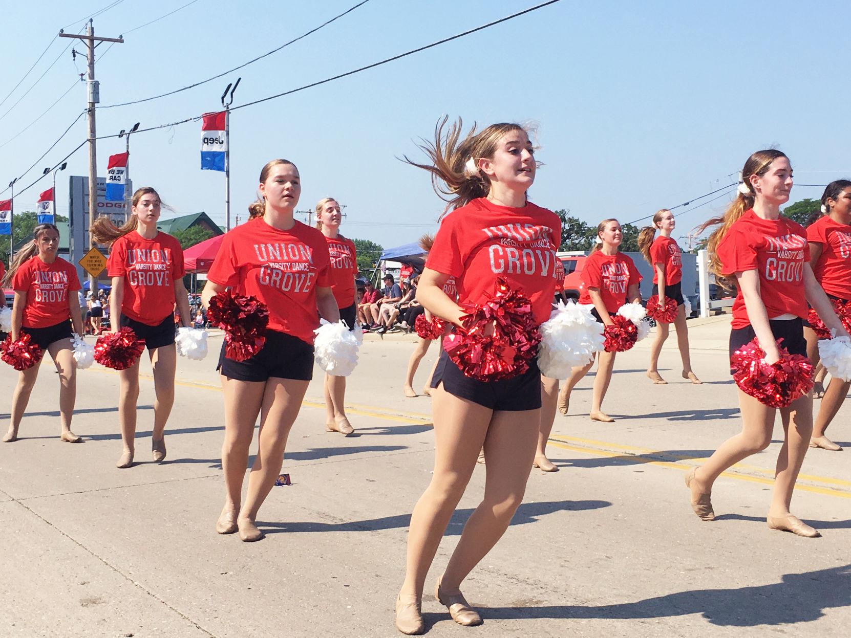 High school varsity dance troupe entertains during Fourth of July parade
