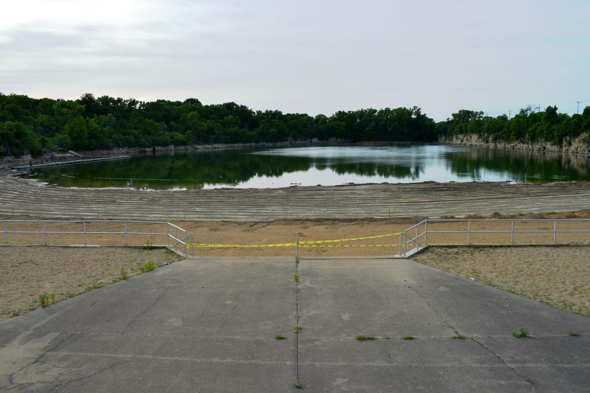 Quarry Lake closed, partially drained for beach restoration Local