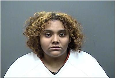 Kenosha woman accused of trying to run over man in a parking lot