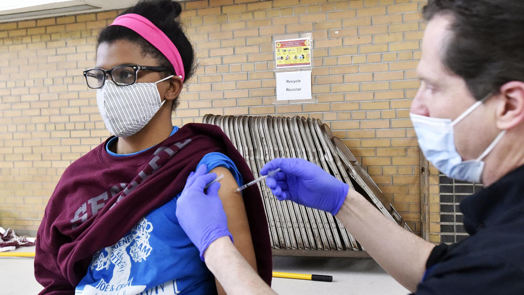 Racine pharmacist brings vaccines to the community as city waits for public to come to Festival Hall - Vimarsana News
