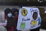 Julian Thomas Elementary students arrive to honor MLK