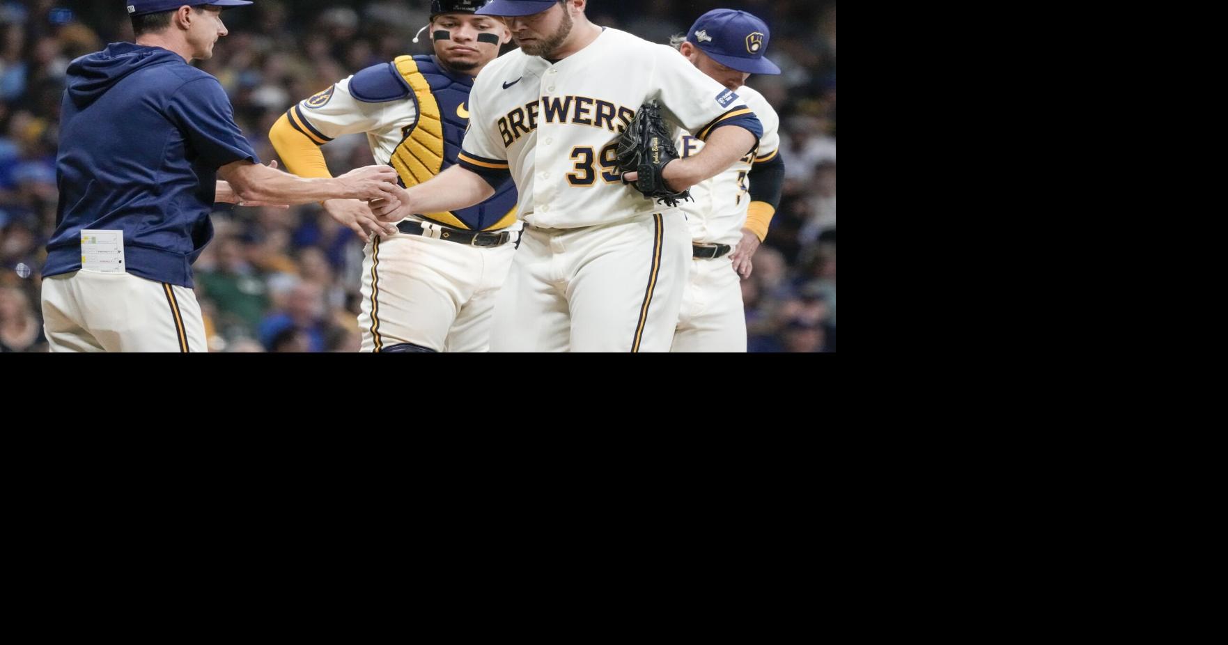 Burnes gets hit hard as Brewers strand 11 runners on base