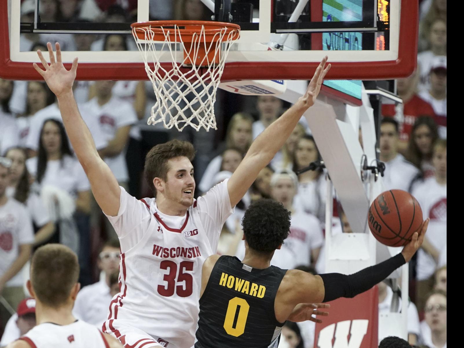 College Basketball Badgers Use Balanced Attack To Defeat Rival