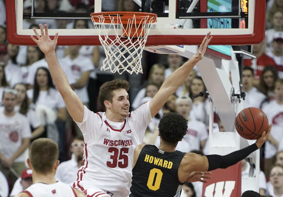 College Basketball Badgers Use Balanced Attack To Defeat Rival
