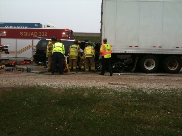 Three injured when SUV slams into semi truck
