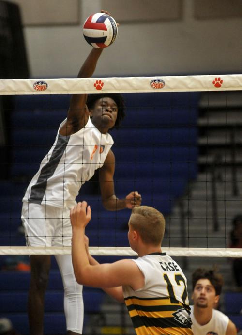 In Photos: Park rallies past Case in boys volleyball