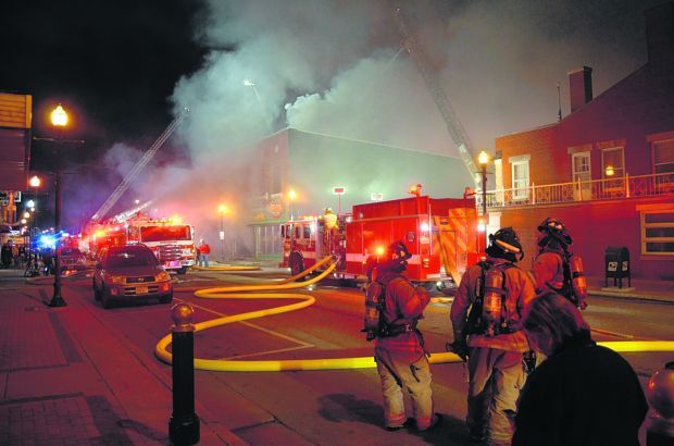 Firefighters search for cause of Burlington furniture ...